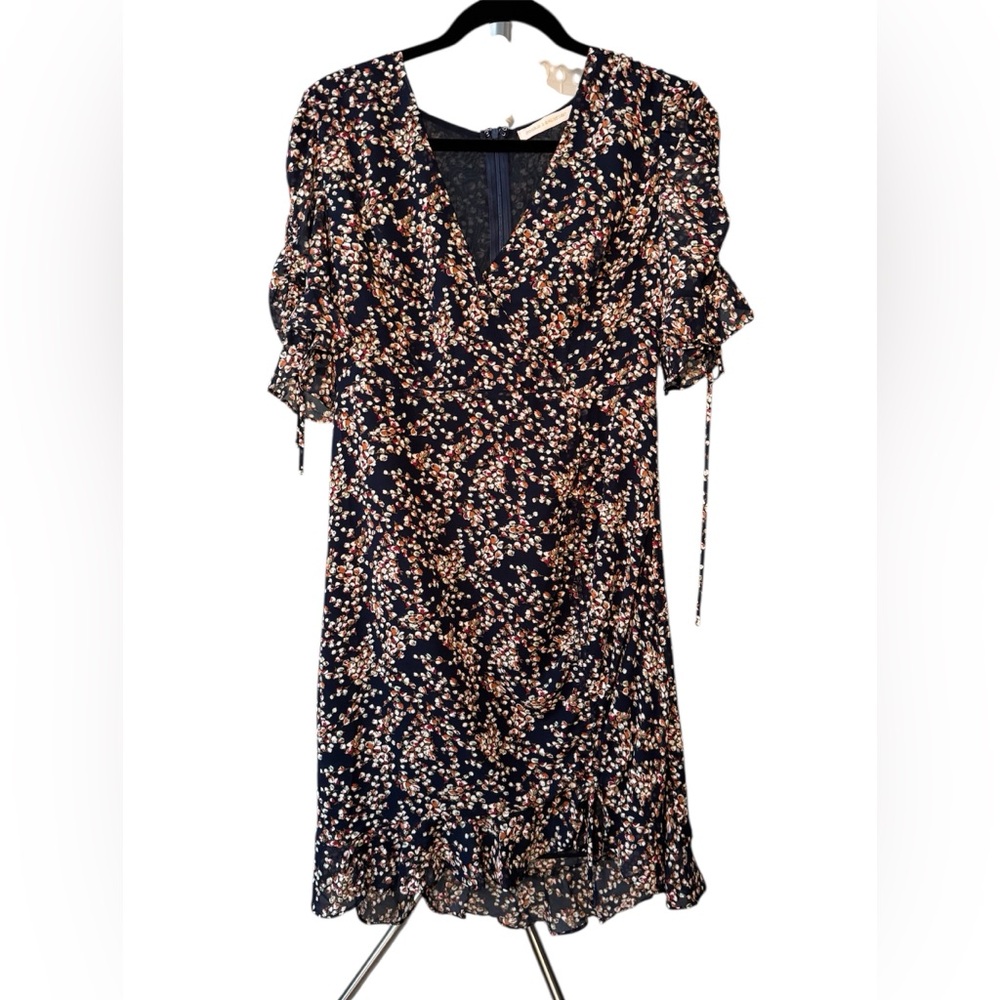Flirty floral multi coloured blue background dress.